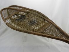 A Pair of Vellum and Timber Frame Snow Shoes.