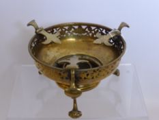 Brass Antique Candle Stand, of decorative floral design with "Fleur de Lys" supports, on tripod base