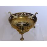 Brass Antique Candle Stand, of decorative floral design with "Fleur de Lys" supports, on tripod base