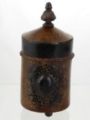 A Metal Tobacco Jar, hand painted with a star shaped finial.