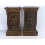 Three Antique Carved Oak Panels, together with a carved stained oak panel with carved floral