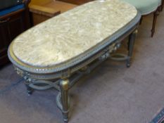 A Louis XIV Style Marble and Gilded Coffee Table, the oval ended table having ribbon border with