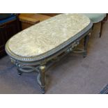 A Louis XIV Style Marble and Gilded Coffee Table, the oval ended table having ribbon border with