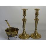 A Pair of 19th Century Brass Candle Sticks, together with a 19th Century skillet. (3)