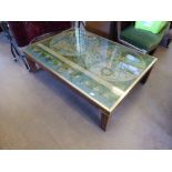 A Brass and Glass Coffee Table, with antique globes inserts with Latin inscription, approx 133 x