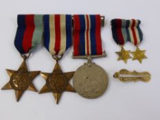 A Group of WWII Medals, including 1939-45 King George, The 1939-1945 Star and The France and Germany