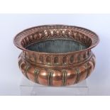 An Antique Rose Copper Jardiniere, decorative moulding to the bowl, approx 36 x 36 cms.