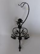 An Antique Wrought Iron Candle Stand, the candle stand supported on tripod base, approx 78 cms