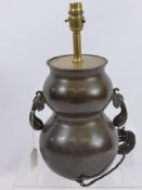 A Chinese Bronze Double Gourd Vase converted to a lamp base.