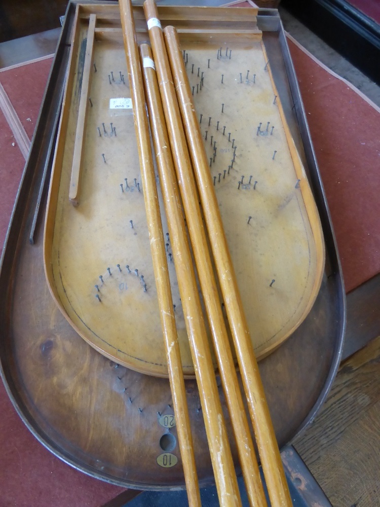 Two Antique Bagatelle Boards with four cues. (6)