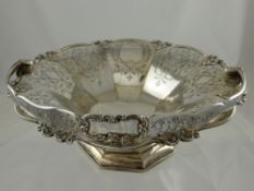 A Victorian Silver Fruit Bowl, takes the form of a basket, with shaped rim, floral engraving