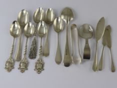 Twelve Miscellaneous Silver Spoons, including three presentation teaspoons, caddy spoon, three