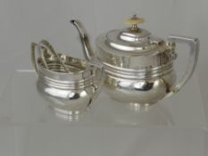 A Solid Silver Bachelor Tea Pot and Sugar Bowl, Birmingham hallmark, dated 1902, m.m L & S, the