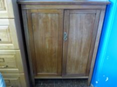 A Circa Early 20th Century Mahogany Cupboard, two internal shelves, supported on tapered legs,