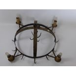 An Antique (Miniature) Cast Iron Game Crown, with candle sconces and game hooks.