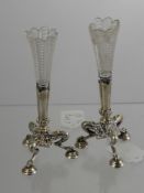 A Pair of Silver Candle Holders, m.m Walker and Hall, Sheffield hallmark, tripod base on hoof