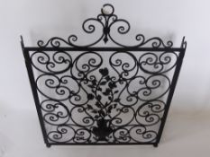 A Wrought Iron Fire Screen, of decorative floral design, approx 75 x 102 cms