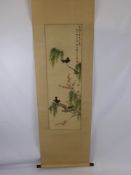 A Hand Painted Chinese Scroll Painting, depicting two black birds amongst cherry blossom, with