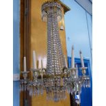 An Elegant Antique Gilded Brass Six Branch Crystal Chandelier, wire conversion.