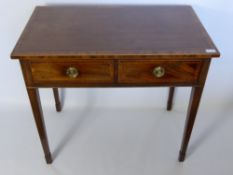 A Georgian Oak Writing Desk, on tapered legs with two short drawers, brass handles, approx 72 x 82 x