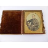 An Edwardian Portrait Miniature of a Gentleman, in the original gilt frame leather and velvet