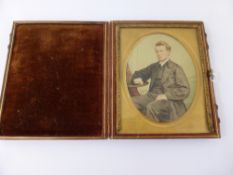 An Edwardian Portrait Miniature of a Gentleman, in the original gilt frame leather and velvet