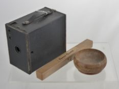 An Antique Treen Bowl, the back of the bowl reads: Made from the original timber of H.M.S Victory