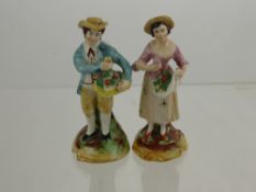Two Continental Porcelain Figurines, depicting fruit sellers, approx 17 cms
