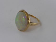 A Lady's Antique 14 ct Opal Ring, the opal is 18 x 16 mm, size N, approx 4.5 gms.