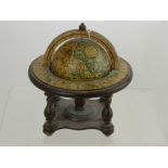 A Miniature Wooden Astrological Globe, the globe having the astrological signs the months written in