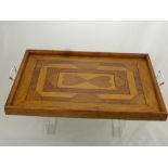 A Treenware Tray made of several different woods with metal handles, approx 49 x 34 cms. .