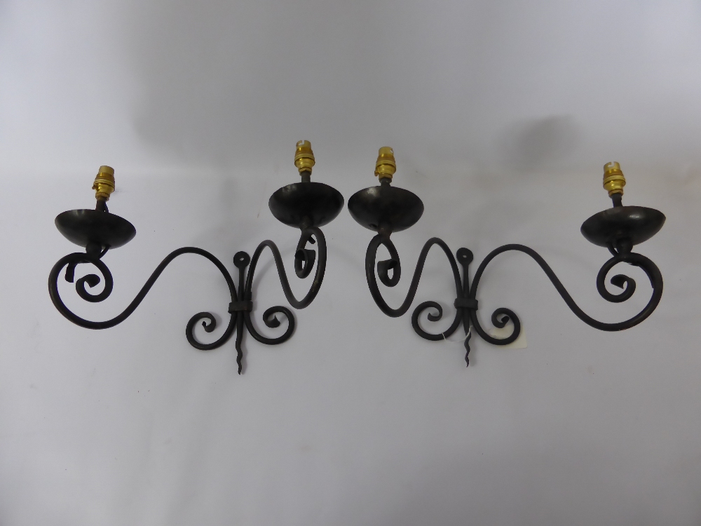 A Pair of Wrought Iron Wall Lights. (2)