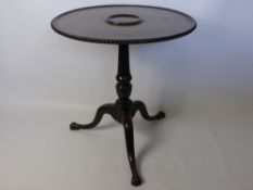 18th Century Carved Mahogany Tripod Table, on turned column support, with central decanter insert.