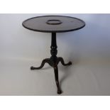 18th Century Carved Mahogany Tripod Table, on turned column support, with central decanter insert.