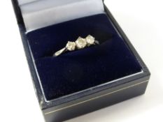 A Lady's Platinum and Diamond Ring, size 0, 3 gms, centre diamond 4 mm and outside diamond 3 mm.