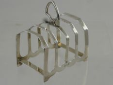 A Silver Art Deco Toast Rack, London hallmark, dated 1934, m.m WB & S, approx 108 gms