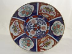 A Japanese Imari Charger, Enchantment by Banfatan, decorated with peony and phoenix together with