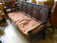 A Circa 18th Century Oak Settle, the settle having a panelled back on cabriole legs, approx 69 x 190