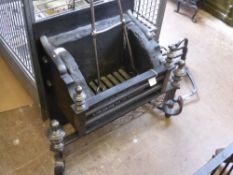 A Cast Iron Fire Basket and Stand, with integrated fire dogs and fire back.