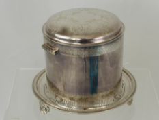 A Silver Plated Biscuit Barrel, the barrel standing on a circular lattice work salver, continental