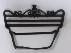 A Wrought Iron Wall Mounted Boot Scrape, approx 56 x 28 cms.