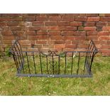 A Rectangular Iron Club Fender approx 134 cms wide x 49 cms high, scroll decoration to front.