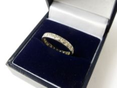 A Lady's White Gold and Diamond Full Eternity Ring, size K, approx 2.3 gms