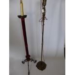 A Wrought Iron Standard Lamp, together with a brass standard lamp, approx 147 x 42 cms and 152 x