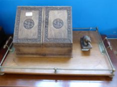 A Carved Oak Stationery Cabinet, together with an Edwardian oak butler's tray and an ink blotter