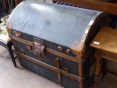 A Vintage Steamer Trunk with leather handles and fittings.