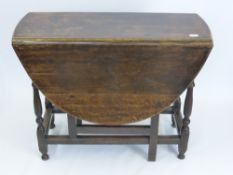 A Late 18th Century Oak Drop Leaf gate leg Table, approx 90 x 40 x 58 cms.