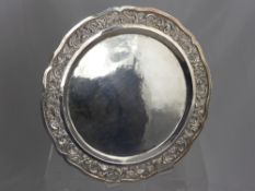 A Solid Silver Salver, having floral decoration to border approx 490 gms.