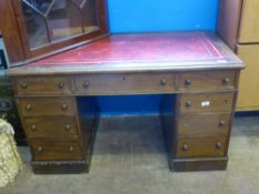 A Twin Pedestal Writing Desk with red leather insert, three drawers to top and six drawers beneath.