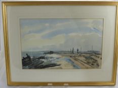 Karl Hagedorn RBA.RI, 1889 - 1969,  a water colour on paper depicting "Wreckage at Lowestoft"